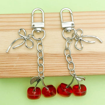 Cherry Charm Keychains Featuring Red Cherry Across 29 Pictured Variations