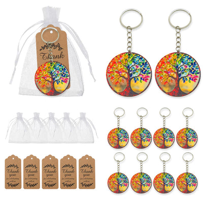 Packaged and unpackaged tree keychains shown with white organza bags and kraft thank-you tags.