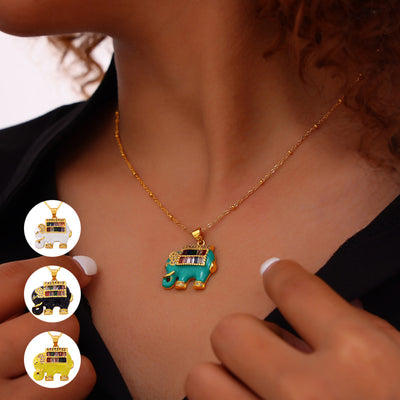 Teal enamel elephant necklace worn with color swatches