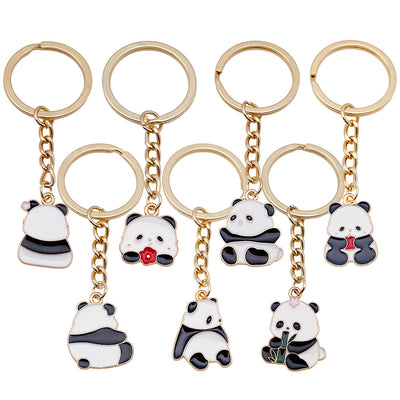 Clean white background catalog view of six bamboo apple and flower panda keychains