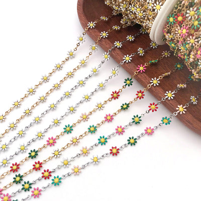 Colorful jewelry chain jewelry findings arranged on a light background