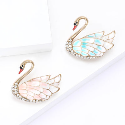 Enamel Swan Brooch shown alone on a light background