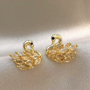 Gold Tone Crystal Swan Stud Earrings With Textured Wings