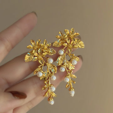 Gold Tone Leaf and Pearl Cascade Statement Earrings