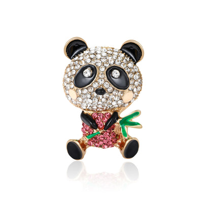 Front view of the panda and bamboo brooch showing a crystal-covered panda holding green bamboo with a pink bow