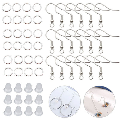 Metallic assorted shape charms arranged on a light background