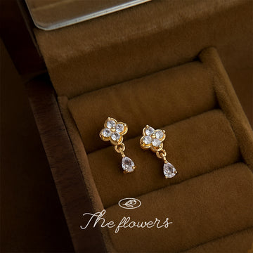 Gold Tone Clear Stone Four Petal Flower Teardrop Stud Earrings
