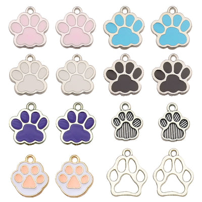 Colorful cat paw charms arranged on a light background