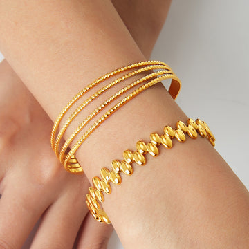 Gold Open Cuff Bangles Quad Textured And Oval Bead