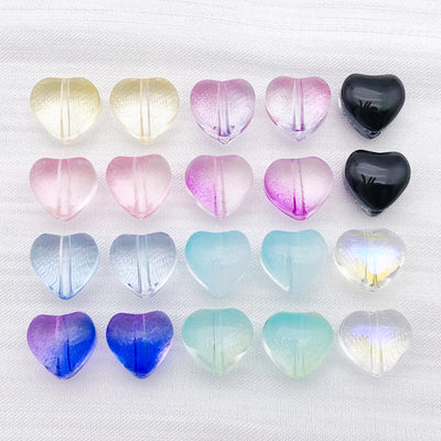 Colorful heart charms arranged on a light background