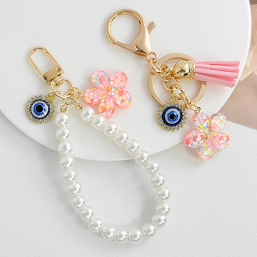 Pearl Beaded Wristlet Keychain with Evil Eye and Glitter Flower Charm