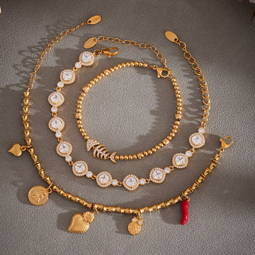 Crystal Station Charm and Fish Skeleton Bracelets in Two Finishes