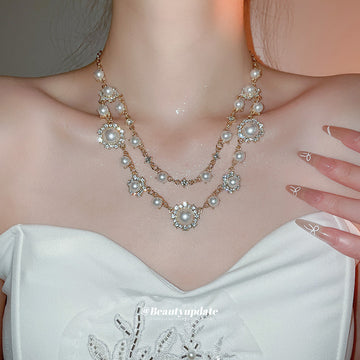 Layered Faux Pearl And Crystal Necklace In Two Finishes