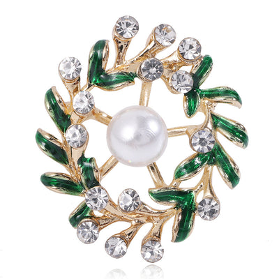 pearl center leaf wreath brooch shown in the main product arrangement