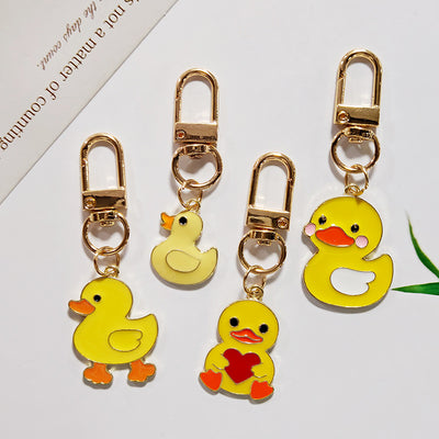 Main product view of yellow Duck Figure Gold Tone Clip Charms in Four Designs