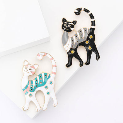 Striped Enamel Cat Brooch in Black or White Finish shown from the front on a white background