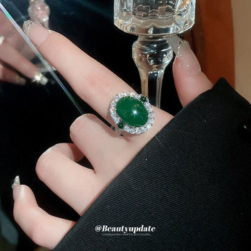 Silver Tone Green Oval Cabochon Open Ring With Clear Crystal Halo