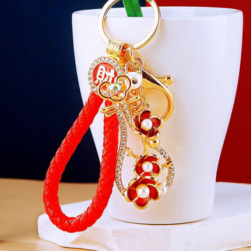 Floral Pipa Keychains With Enamel Bodies and Braided Wrist Straps