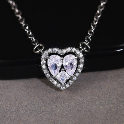 Silver Tone double heart halo pendant shown in front detail view