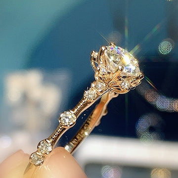 Gold Tone Starburst Crystal Solitaire Ring with Polished Finish