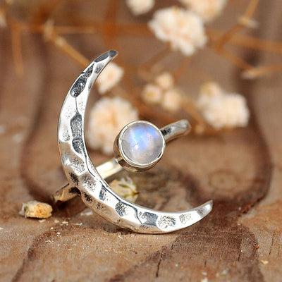 Image 1 showing crescent moon iridescent open ring
