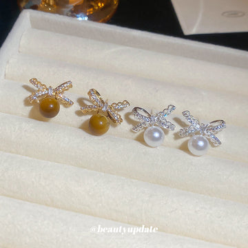 Crystal Bow Stud Earrings With Amber Tone Round Drops