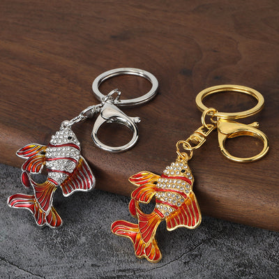 Gold-tone and silver-tone rhinestone goldfish keychains