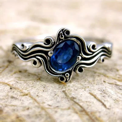 Image 1 showing blue oval wave ring
