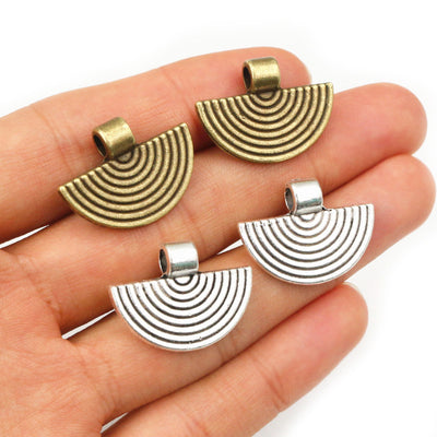 Ridged fan pendants showing assorted shapes and finishes