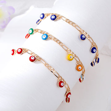 Gold Tone Curb Chain Bracelets with Dangling Evil Eye Beads