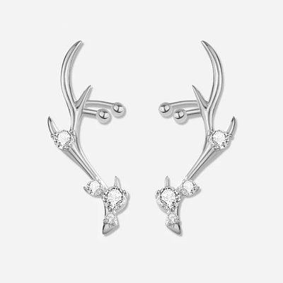 Pair of silver antler ear climber studs with clear stones front view