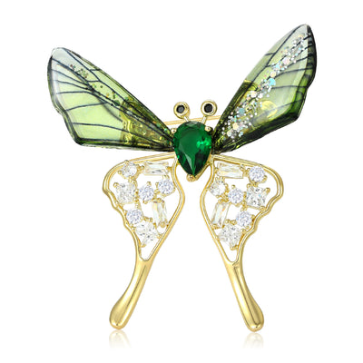 Gold green acrylic glitter butterfly brooch front on white