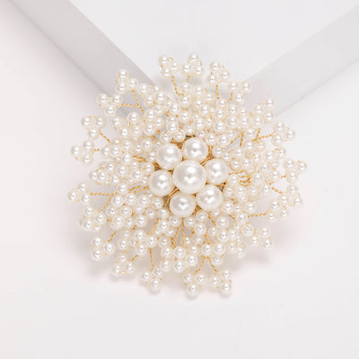 White pearl cluster snowflake brooch with gold wire stems front view