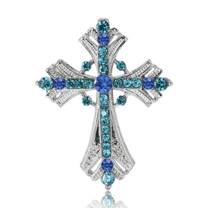 Ornate Cross Brooch An Ornate Silver-Tone Cross Set