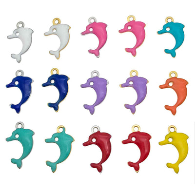 Colorful dolphin charms arranged on a light background