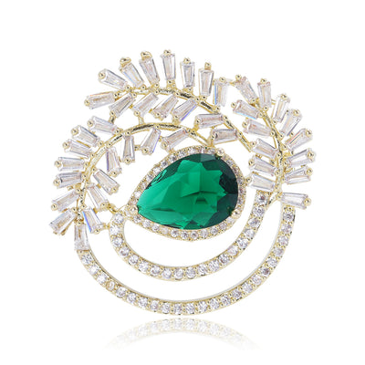 Green teardrop crystal brooch gold baguette leaf fan front