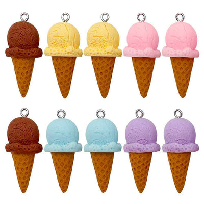 Multicolor ice cream charms arranged on a light background