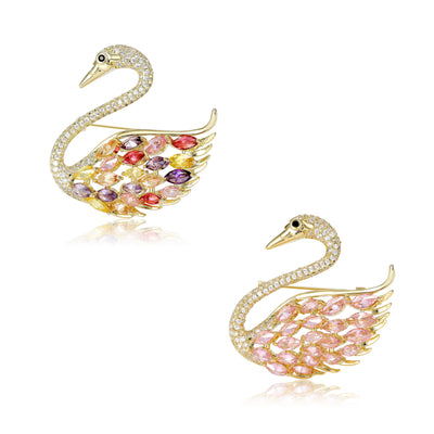 Front view showing the gold tone swan brooch with pink or multicolor crystal wing