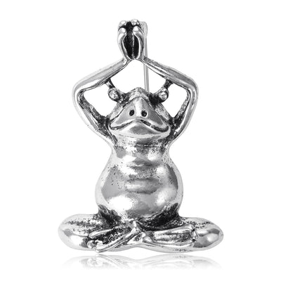 Yoga Frog Enamel brooch In Silver And Green Decorative Lapel Pin shown in front view on a light background
