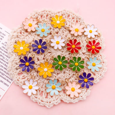 Printed detail graphic for the daisy and sun charms