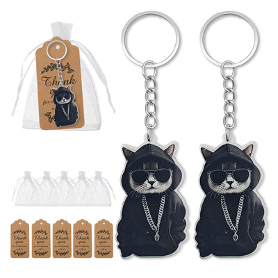 Composite image showing two hooded cat keychains, an organza bag and brown thank-you tags.