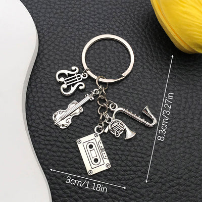 Main display of silver tone saxophone cassette and microphone keychain