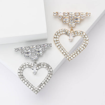 Front product view of the crystal open heart drop brooch on a light background