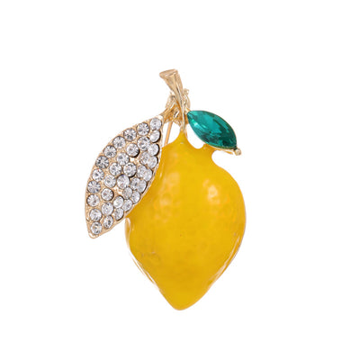Front product view of the flower brooch pin in yellow and gold