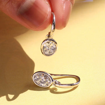 Silver Tone Oval Bezel Clear Stone Lever Back Drop Earrings