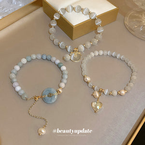 Three Beaded Bracelet Designs With Donut Heart And Cat Motifs
