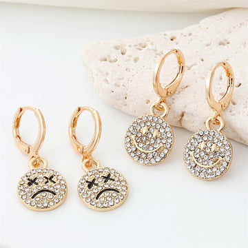 Gold Tone Crystal Smile and Frown Medallion Huggie Earrings