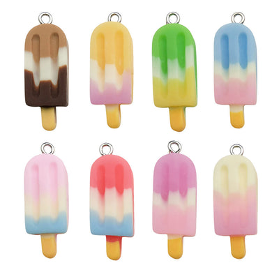 Colorful ice cream charms arranged on a light background