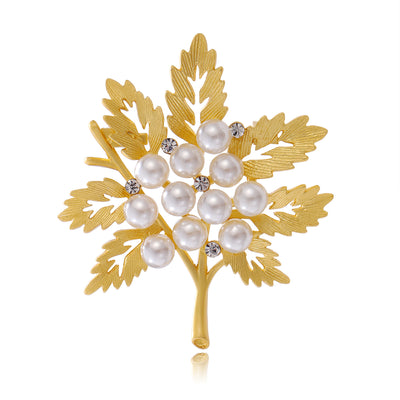 Front product view of an elegant gold brooch