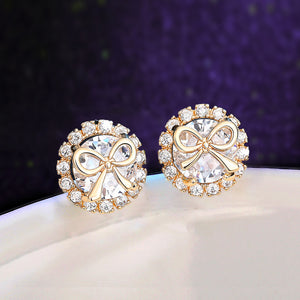 Gold Tone Bow Stud Earrings with Crystals and Pearl Drops